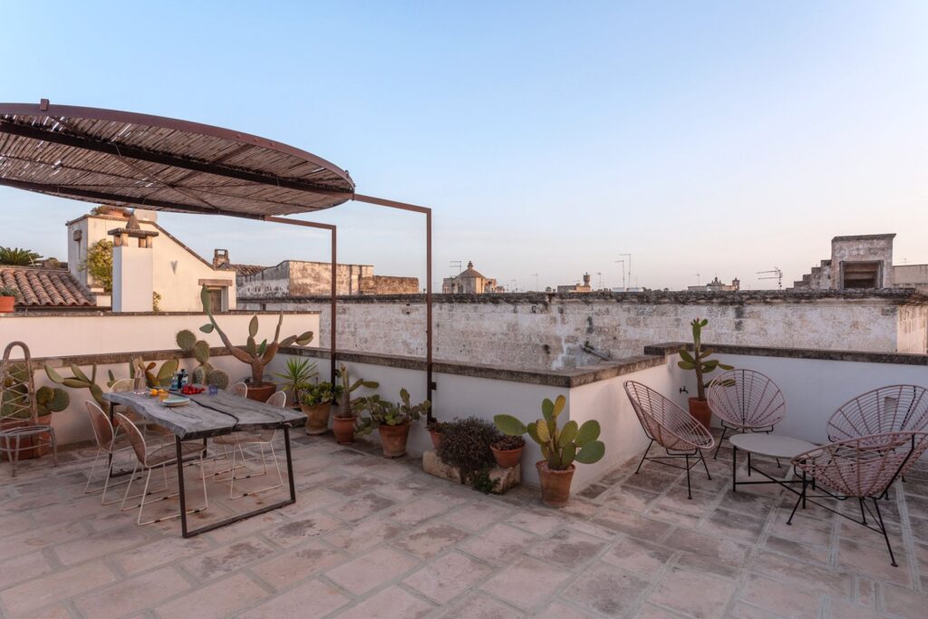 Rooftop terrace with dining table, cacti and a church tower view, Teatro, Nardò